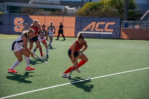 No. 15 Syracuse defeated No. 16 Louisville 2-1 for its first ranked win since Sept. 1.