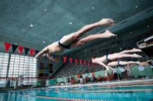 Syracuse swimmers compete in a dual meet against Seton Hall on Saturday.