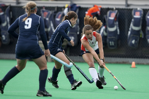 Maggie Befort (right) has made the switch back to her original forward position in her senior year with Syracuse.