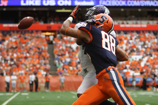 Wide receiver Jarrod West is interfered with during a pass attempt.