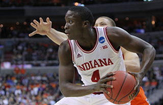 Victor Oladipo #4 of the Indiana Hoosiers holds the ball against Brandon Triche #20.