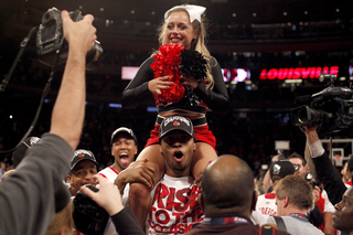 Louisville teammates cheer after their win over Syracuse.