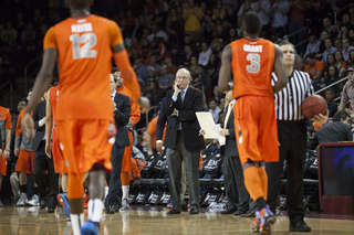 SU head coach Jim Boeheim looks on as Keita and Grant head toward a timeout. 