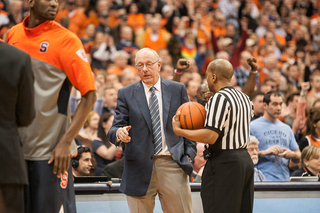 SU head coach Jim Boeheim discusses a play with a referee during a break. 