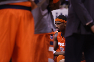 Fair looks on from the bench during a timeout. Clutch shots by the senior helped Syracuse claw back into the game down the stretch. 