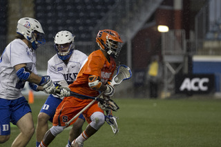 Drew Jenkins splits a Duke double team as he sprints upfield.