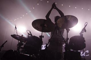 Jeremy Salken, the drummer of Big Gigantic, rocks the F-Shed at the Market on Wednesday.