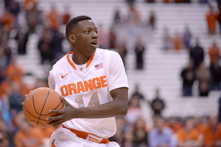 Point guard Kaleb Joseph holds the ball against Holy Cross. Joseph had 14 points, six assists and four turnovers against the Crusaders.