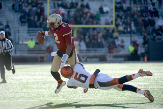 Desir tries to bring down BC quarterback Tyler Murphy. 