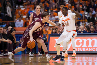 Joseph defends against Raiders guard Sean O'Brien. SU's freshman point guard had no fouls on the night.