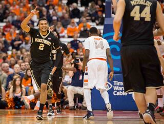 Thomas signals to teammate Konstantinos Mitoglou as he gets back on defense.