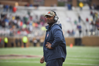 Syracuse head coach Dino Babers looks on. 