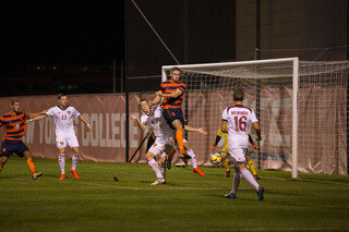 John-Austin Ricks goes up for a header.