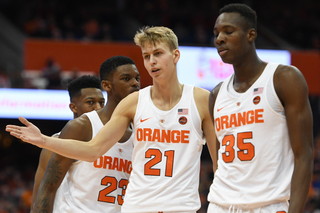 Syracuse forward Marek Dolezaj reacts after being called for a foul during the game.