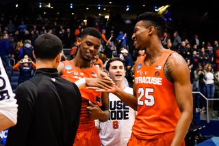 Battle and Howard embrace each other following the four-point victory.