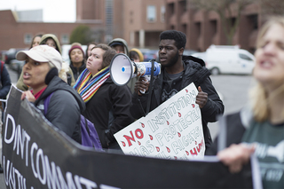 Despite the temperature dipping to 25 degrees Fahrenheit with wind chill, students continue to chant. 