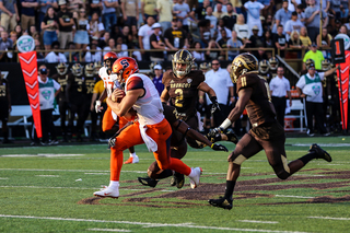 Orange quarterback Eric Dungey set a school rushing record for most yards (200) by a quarterback in a single game.