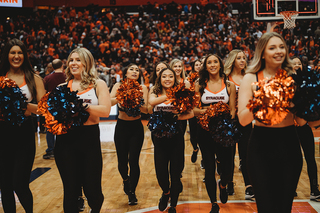 The SU cheerleaders were all smiles after the game.