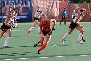 Freshman Charlotte de Vries carries the ball towards Lafayette's net.