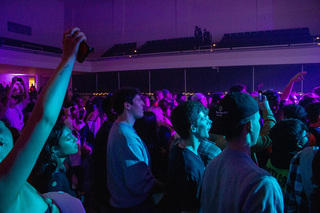 Lights shine across the audience as they sing along to DJ Jill, Zach Fox, and Pi’erre Bourne. 