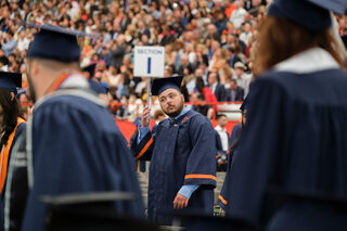 Students adjusted the tassels on their graduation caps to signify their graduation. The Class of 2023 experienced the COVID-19 pandemic on their way to reach graduation.   